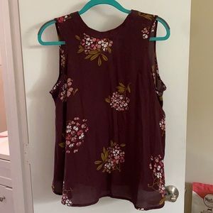 Maroon blouse with a floral print